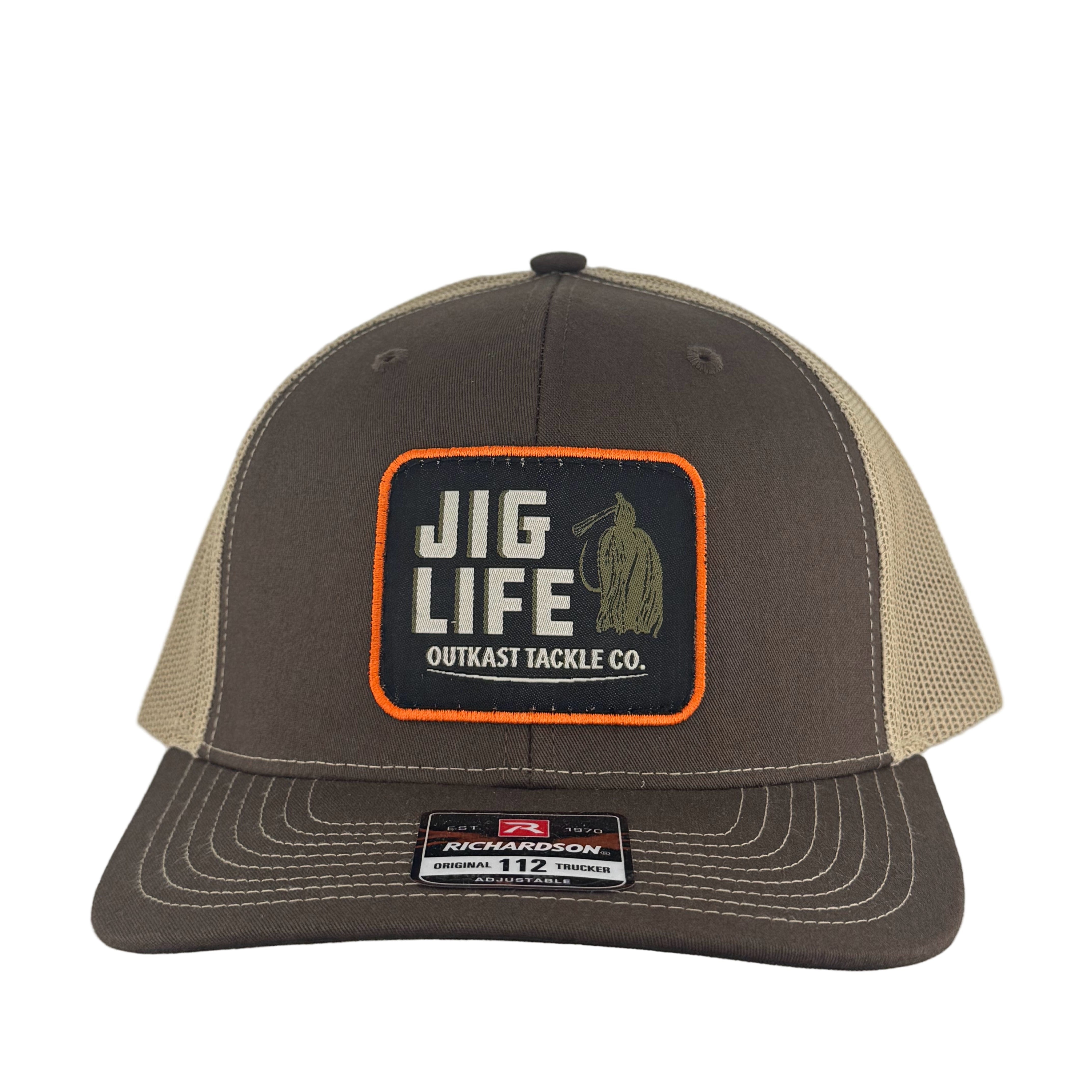 Brown and beige cap with 'Jig Life' patch on a light gray background