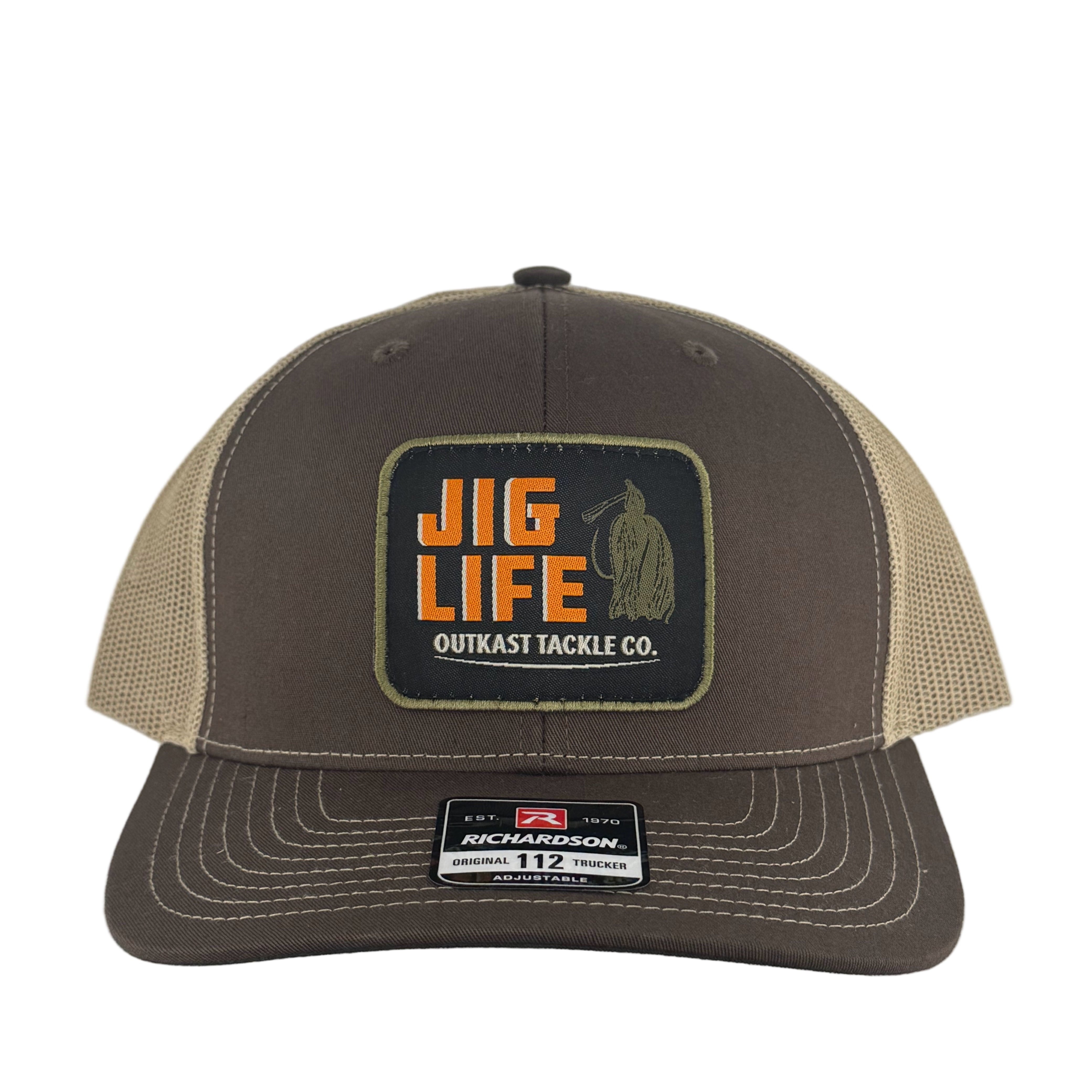 Brown and beige cap with 'Jig Life' patch on a gray background